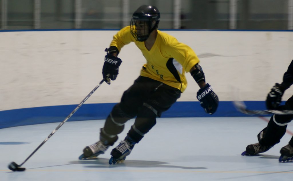 What equipment is needed for roller hockey?